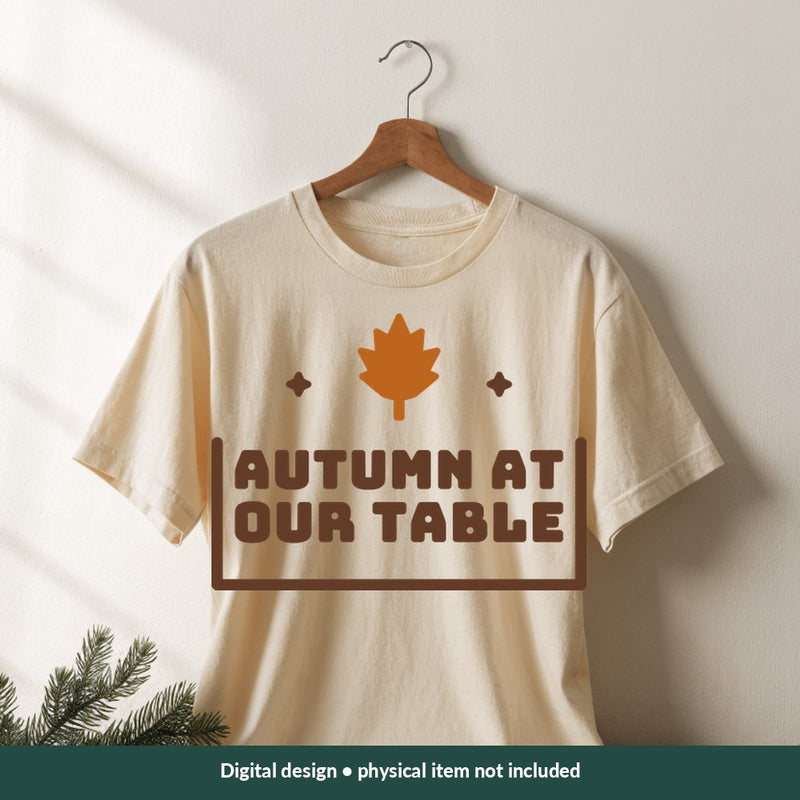 Autumn at Our Table Thanksgiving digital design on a shirt; illustrative mockup, no physical product included