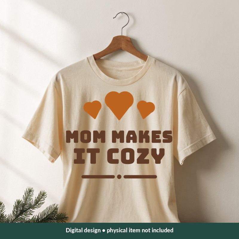 Mom Makes It Cozy Mom-life digital design on a shirt; illustrative mockup, no physical product included