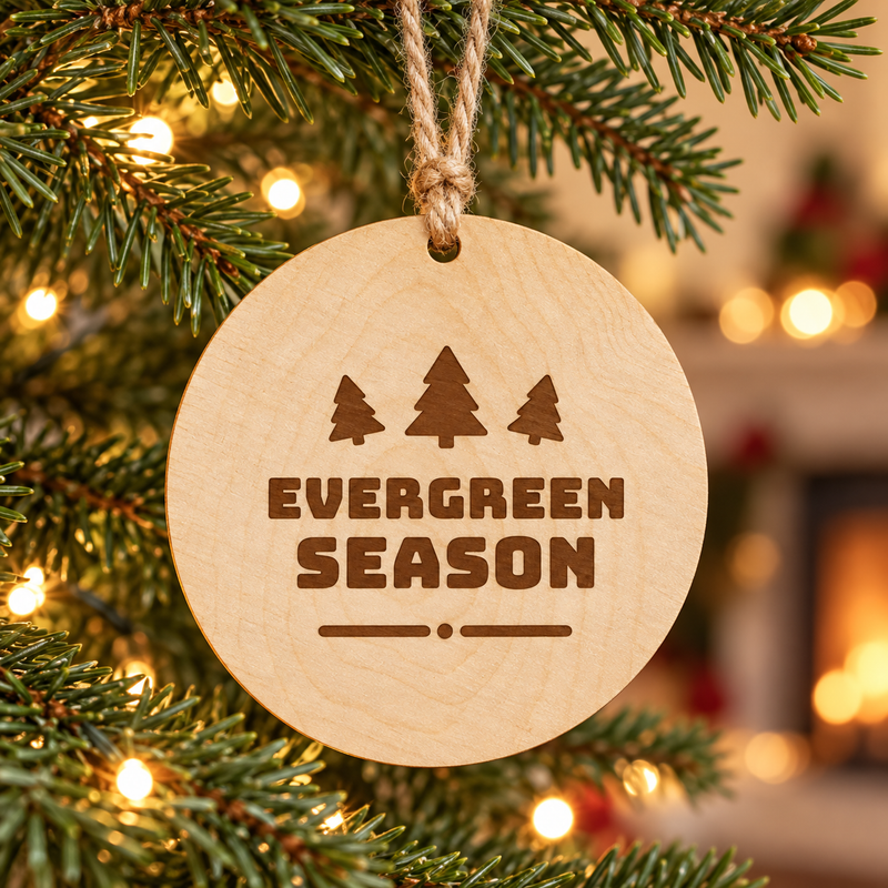 Evergreen Season design on a hanging wood ornament; illustrative engraving mockup, digital artwork only